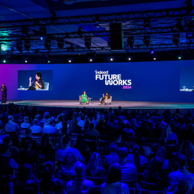 event stage with speakers having a conversation